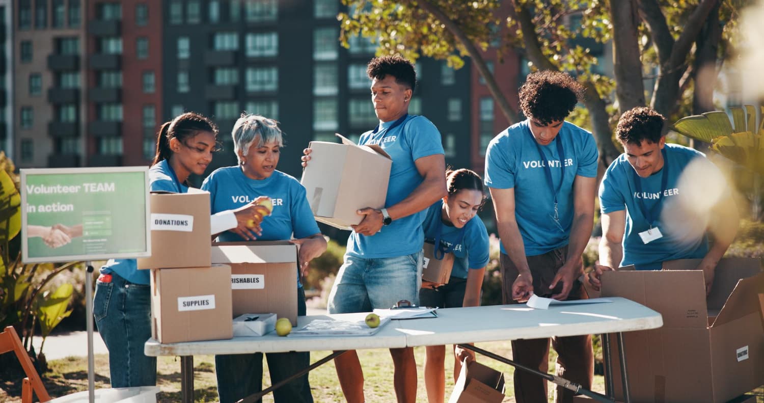 Volunteers helping people